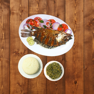 Medium dry fish, served with ugali and Mboga Kienyeji.